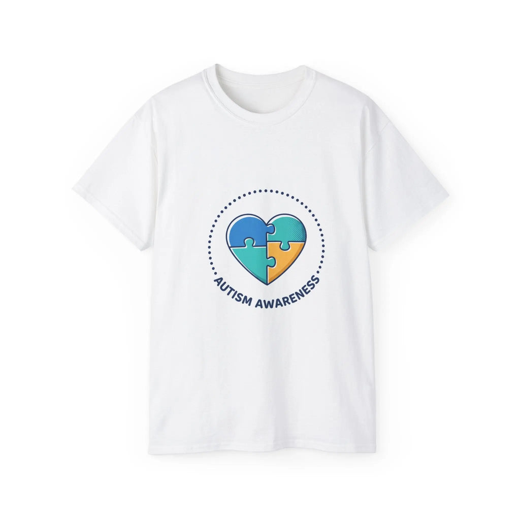 White t-shirt with a heart-shaped puzzle piece design and 'Autism Awareness' text on a white background