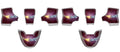 Set of eight red and silver car seat covers with decorative elements on a white background